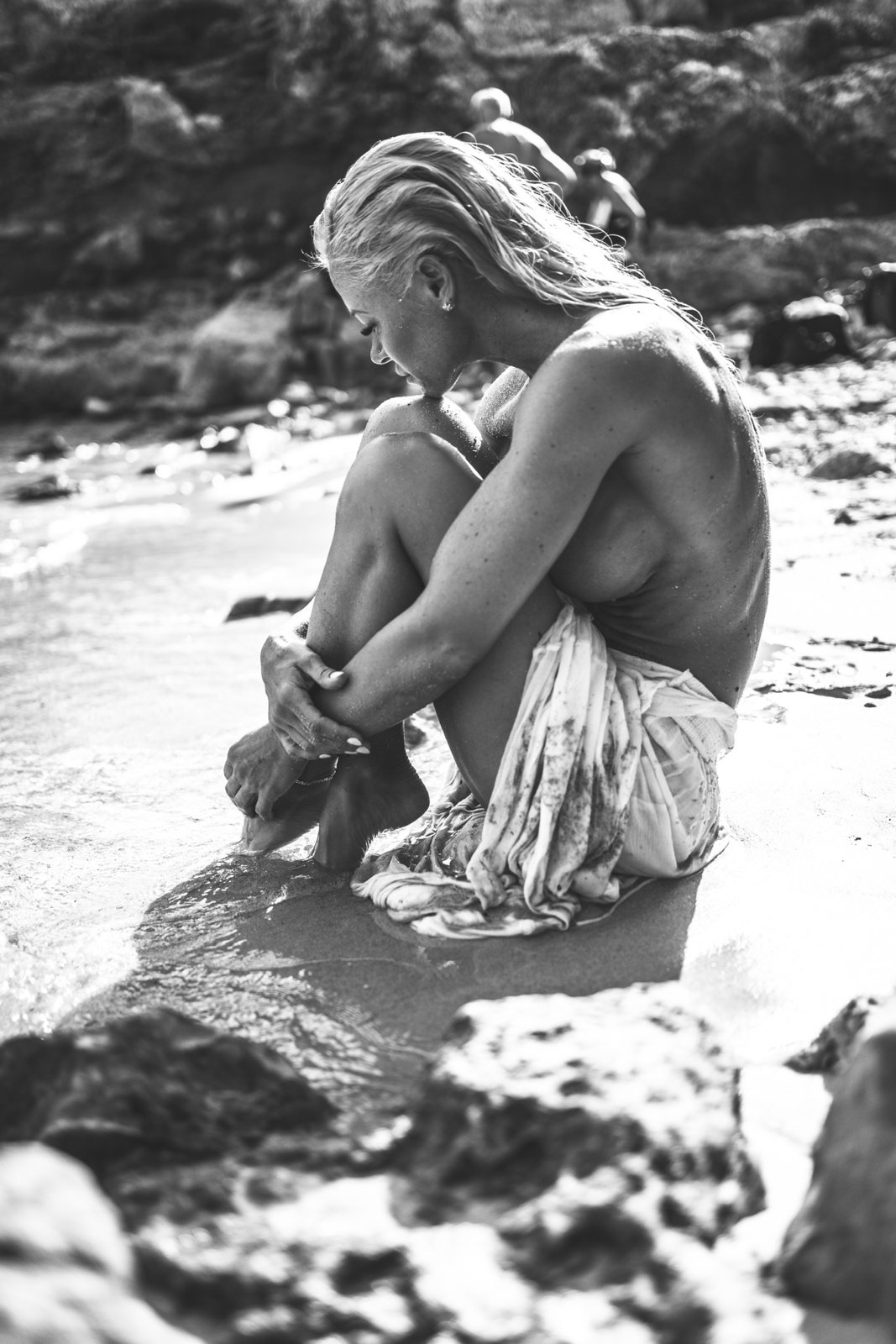 Black and white boudoir portrait on the beach